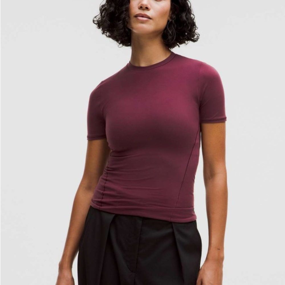 Lululemon Wundermost Ultra-Soft Nulu Hip-Length Crewneck Shirt
Garnet